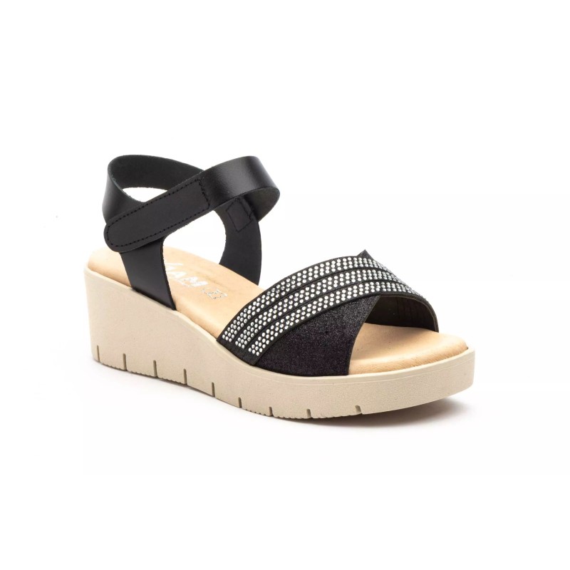 Zuecos de piel negro , planta mullida, cuña, antideslizante